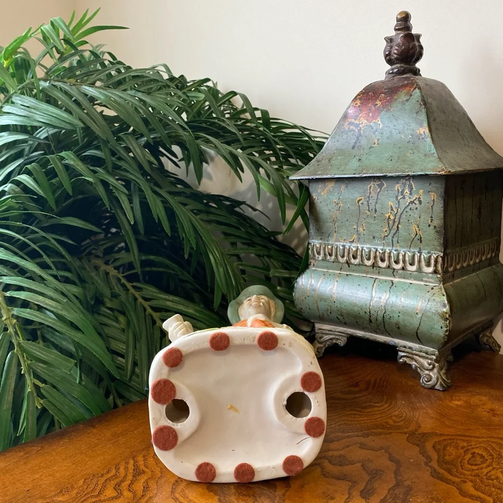Vintage Ceramic Farmer Figurine in Green and Orange